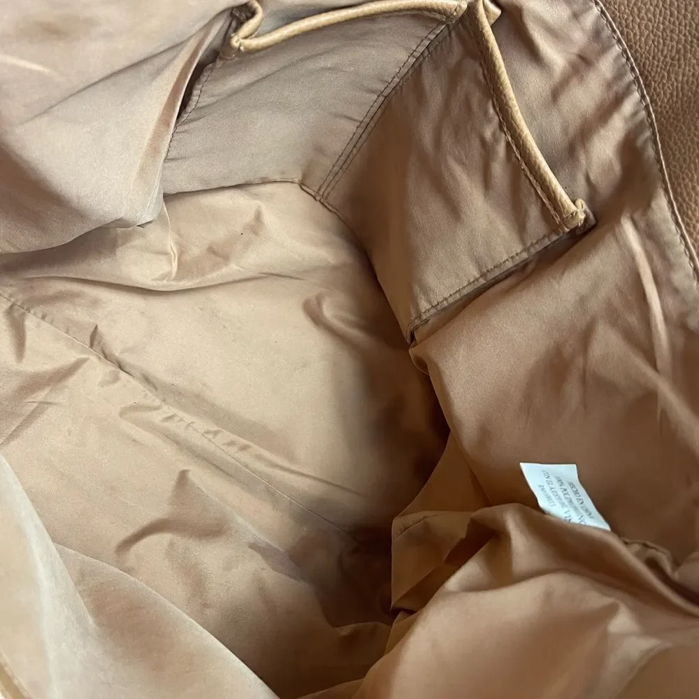 Tyler Rodman beige woven large tote with tan faux leather trim and straps .